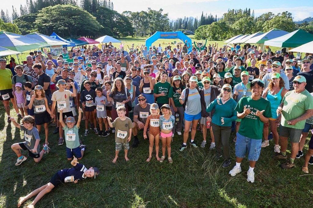 Crowd gathers for outdoor fun run event.